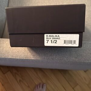 Beautiful Brian Atwood black snakeskin. Gently worn maybe 2-3 times.